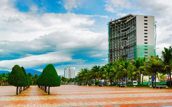 Square with residential buildings in Danang Vietnam reflex