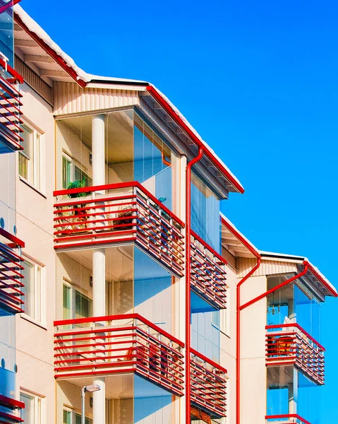 Balconies of apartment residential building in winter Rovaniemi reflex