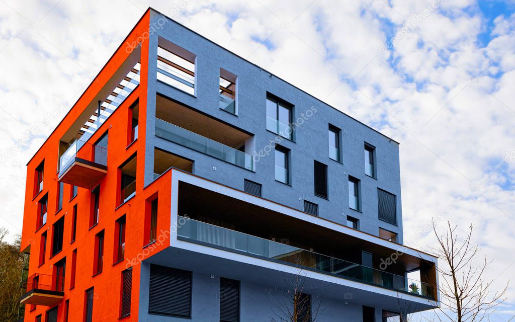 Blue red Modern residential apartment flat buildings exterior Salzburg reflex