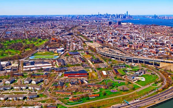 Aerial view of Prospect Park in Brooklyn and Lower Manhattan skyscrapers reflex