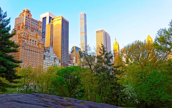 Midtown Manhattan with skyline of skyscrapers in Central Park East reflex — Stock Photo, Image