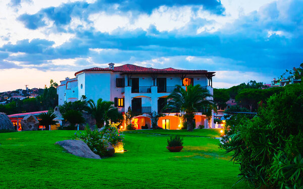 Baja Sardinia resort on Costa Smeralda in evening reflex