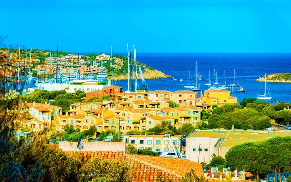 Cityscape with Luxury yachts at marina Porto Cervo Sardinia Italy reflex — 스톡 사진