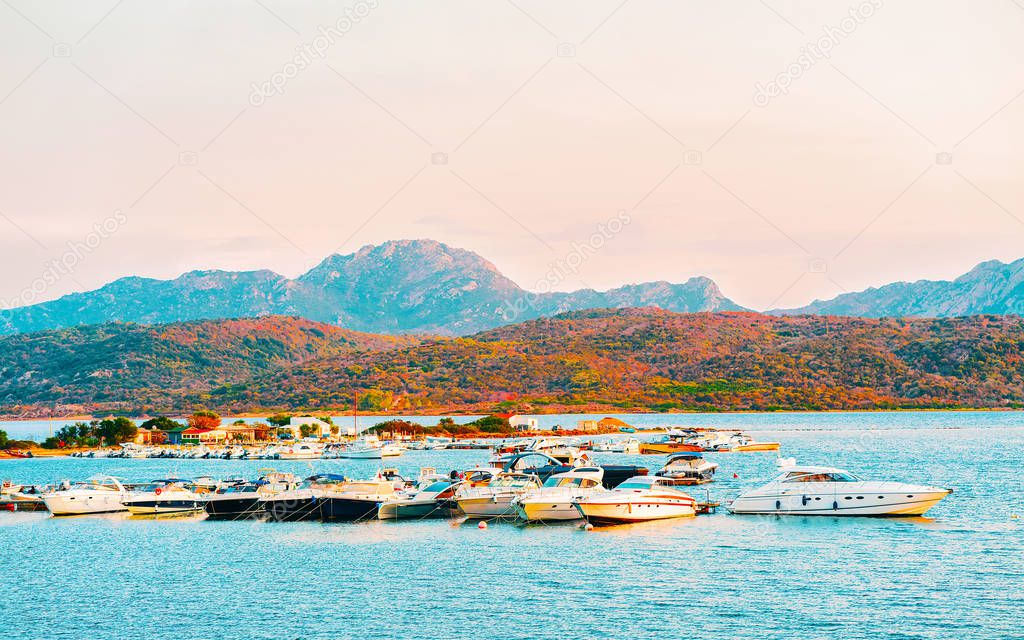 Yachts on Mediterranean Sea on Costa Smeralda in Sardinia Italy reflex