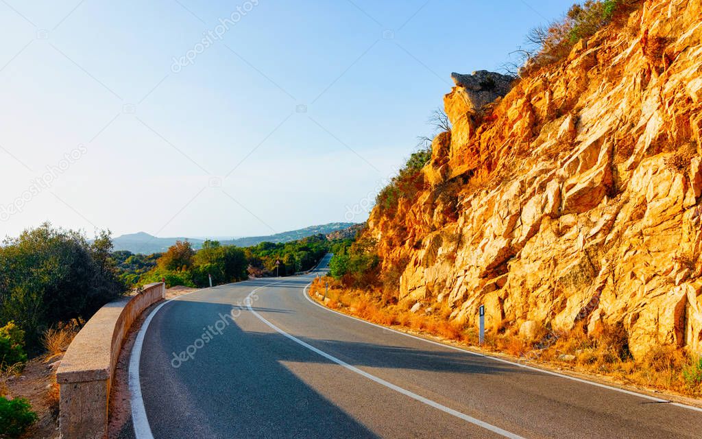 Empty road without cars in Sardinia Island Italy reflex