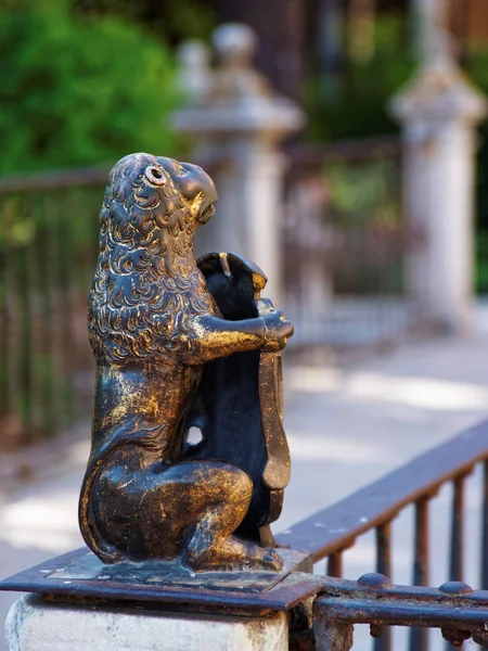 Bronze sculpture at Royal Alcazar Place in Seville