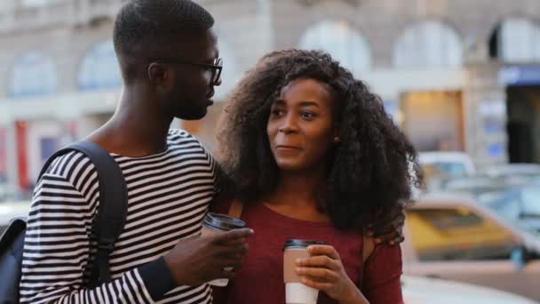 African couple with coffee — Stock Video