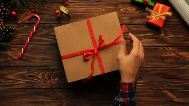 Woman wrapping Christmas present 
