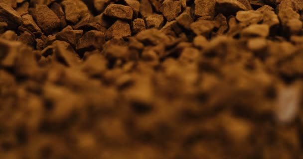 Macro shooting of the instant coffee pieces. Zoom in. Close up — Stock Video