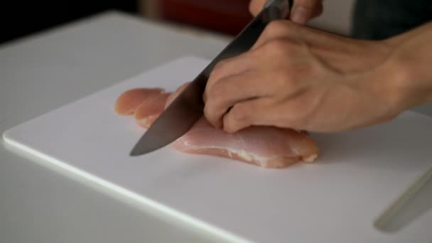 Chopping chickens in kitchen — Stock Video