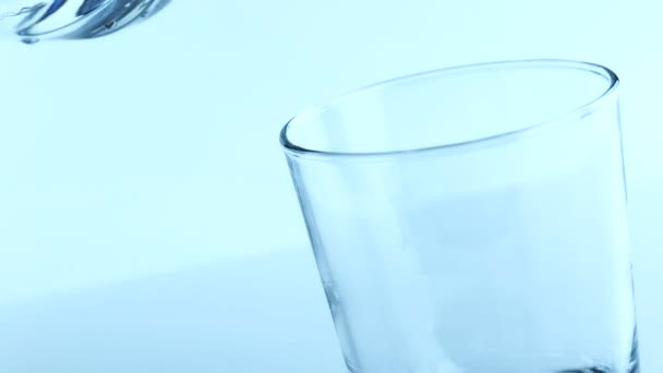 Filling a glass with water, nutrition and health-care — Stock Video