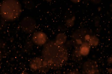 altın parçacıkları siyah zemin üzerinde akış efekti bokeh, tatilde mutlu yıllar