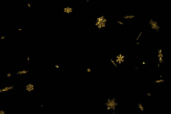 abstract gold glitter sparkle christmas snowflakes falling down snow from top, winter holiday xmas seamless loop