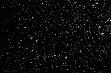 soyut toz parçacıklarının koyu arka plan üzerinde