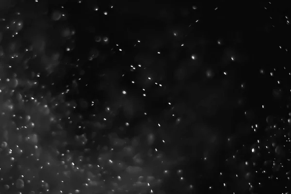 Абстрактные частицы пыли на тёмном фоне — стоковое фото