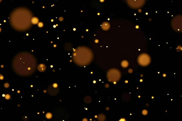 Gold glow particles bokeh flowing effect on black background, holiday happy new year — Stock Photo, Image