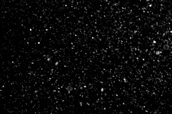 abstract dust particles on dark background