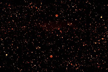 Altın glitter pırıltı parçacıklar bokeh siyah arka plan, olay festival üzerinde mutlu yeni yıl tatili kabarcıklar.