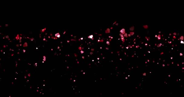 День Святого Валентина, водоспад червоних сердець у формі на чорному фоні, святковий день святкового Валентина любов концепція з альфа, канал — стокове відео