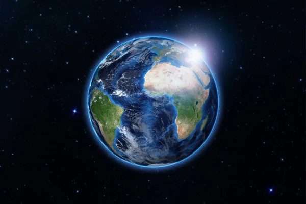 Blue planet earth from space showing America and Africa, USA, globe world with blue glow edge and sun light sunrise on space in a star field — Stock Photo, Image