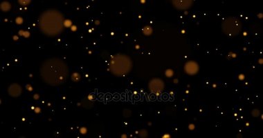 Altın kızdırma ışıltı parçacıklar bokeh akan etkisi siyah arka plan, tatil mutlu yeni yıl