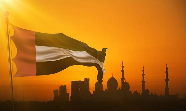 Wehendes Gewebe der Flagge mit der Farbe der vereinigten arabischen Emirate bei Sonnenuntergang mit Sonnenstrahlen Licht, uae — Stockfoto