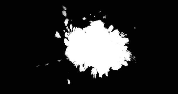 Брызги чернил и стирка на черном фоне — стоковое видео