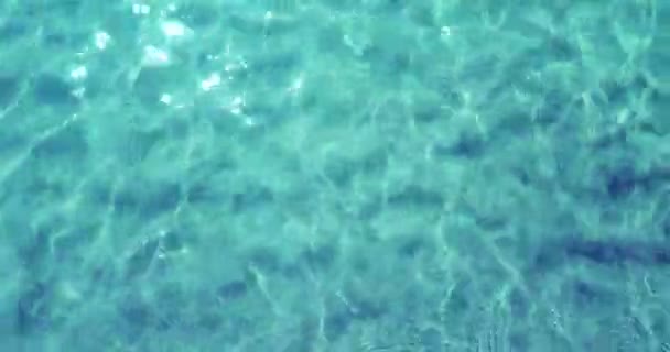 Haut de la vue de la mer des Caraïbes tropicale bleue avec, fond effet texture — Video