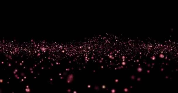 Noël rouge, violet, violet particules de lumière brillance bokeh boucle sur fond noir, fête de félicitations fête bonne année, célébration de Noël — Video