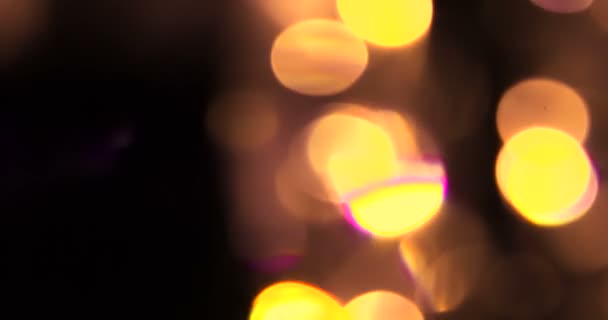 Abstrato circular dourado brilho brilho bokeh movimento fluindo no fundo preto, parabéns festa feliz ano novo, celebração de Natal — Vídeo de Stock