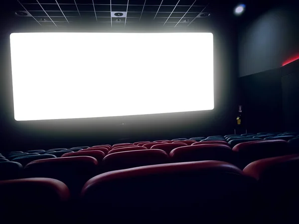 Cinema interior of movie theatre with empty red seats with copys — Stock Photo, Image