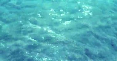 üst kısmındaki mavi tropikal Karayipler deniz doku etkisi geçmişi, dalga okyanus hareketi sorunsuz döngü hazır olan görünümü