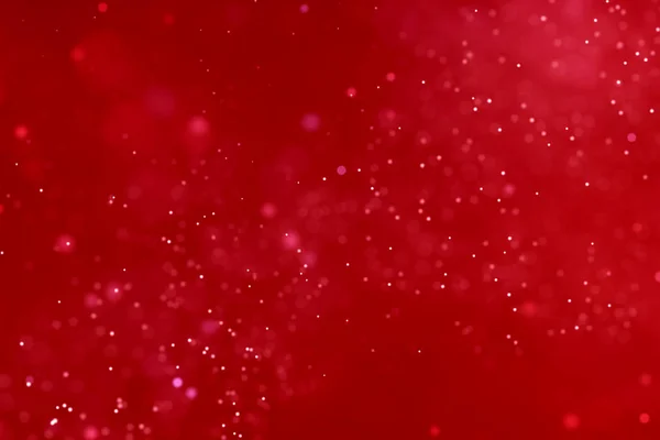 Abstracto gradiente de Navidad fondo rojo con flujo bokeh rojo —  Fotos de Stock