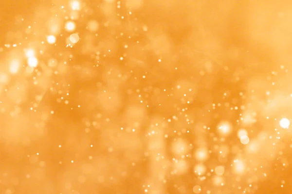 Christmas gold gradient sparkle glitter dust particles from top — Stock Photo, Image