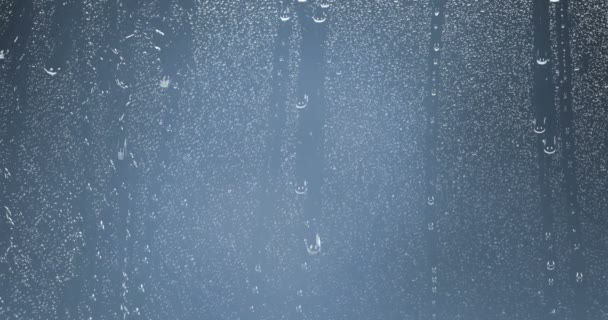 Regentropfen Fallen Auf Glasblauen Hintergrund Wassertropfen Auf Fensterglas — Stockvideo