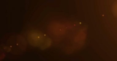 Altın sıcak renk objektif parlama yanıp söner sızıntı ışık efekti için siyah arka plan, bindirme hazır harekette geçişler