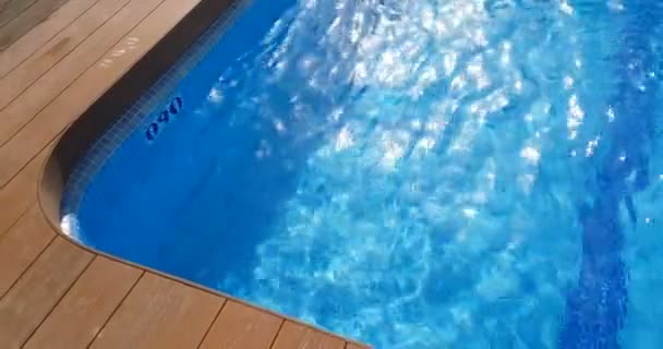 Swimming pool surface caustics ripple like sea water and flow with waves movement background, loop seamless — Stock Video