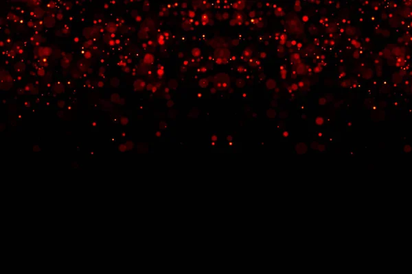 Elvont Vízesések Piros Csillogó Buborékok Részecskék Bokeh Fekete Háttér Karácsony — Stock Fotó