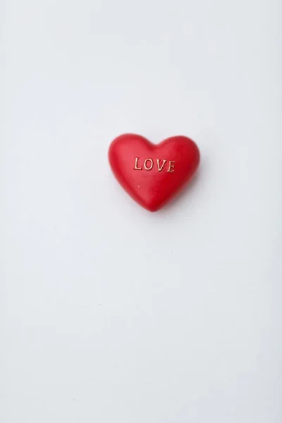 Red heart with love word on white — Stock Photo, Image