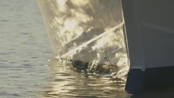 Sun Reflecting Water Floating Boat — Stock Video