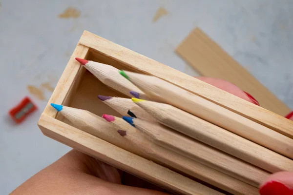 wooden pencil case with colour pencils for back to school