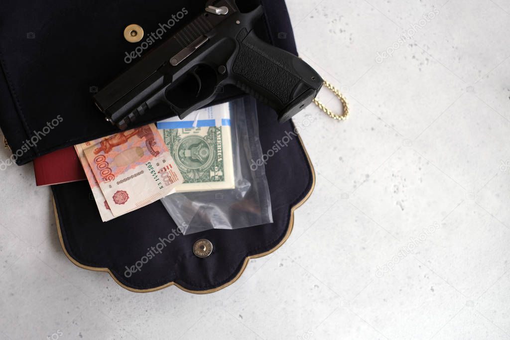 The gun is on the money with your passport, wallet and ammunition