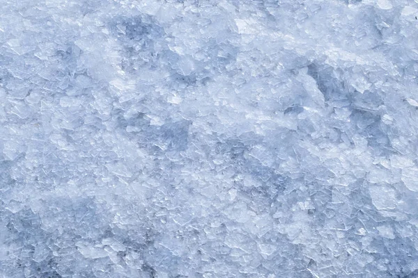 Broken crushed ice fresh cold white winter snow background — Stock Photo, Image