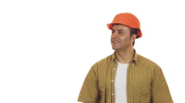 Bir matkap makine ile poz kask içinde neşeli olgun builser