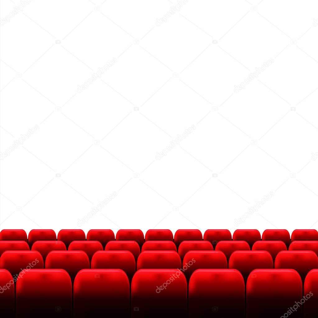 Cinema auditorium with white screen and rows of red seats