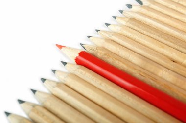 A row of rough graphite pencils with color red one clipart