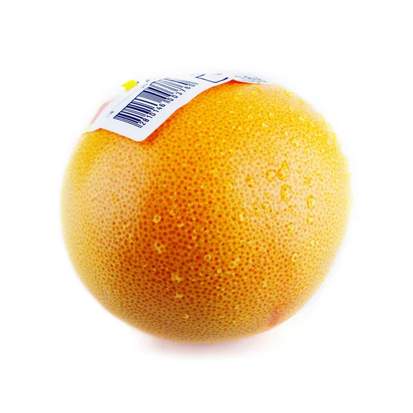 Grapefruit met streepjescode sticker en water druppels — Stockfoto