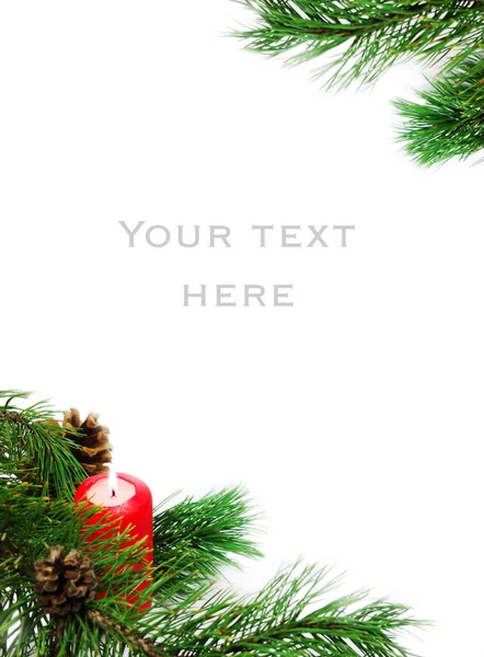 Kerstdecoratie met een pine tak en kaars — Stockfoto