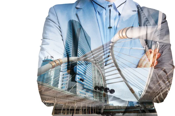 Double exposure of businessman in suit and cityscape. He's looki — Stock Photo, Image