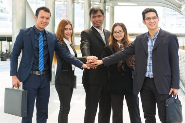 Asya iş takım birlik elleri ile birlikte gösterilen